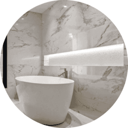 Marvelous Marble bathroom with white marble walls and white tub in Philadelphia