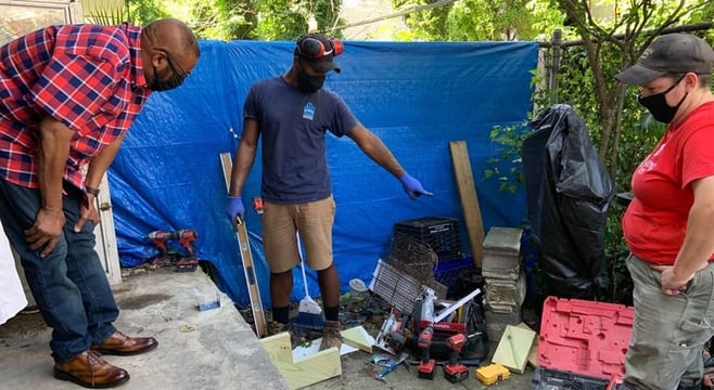 Brianna Chakalis Carpentry Volunteer with Raheem at Remodeling Homes at Rebuilding Together Philadelphia for Bellweather Design-Build