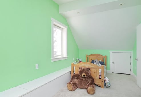 boho playful kids attic bedroom with green walls in Narberth Borough by Bellweather Design Build