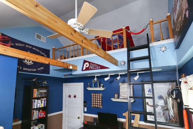 children's bedroom loft with blue walls and bunk bed in Narberth by Bellweather Design Build